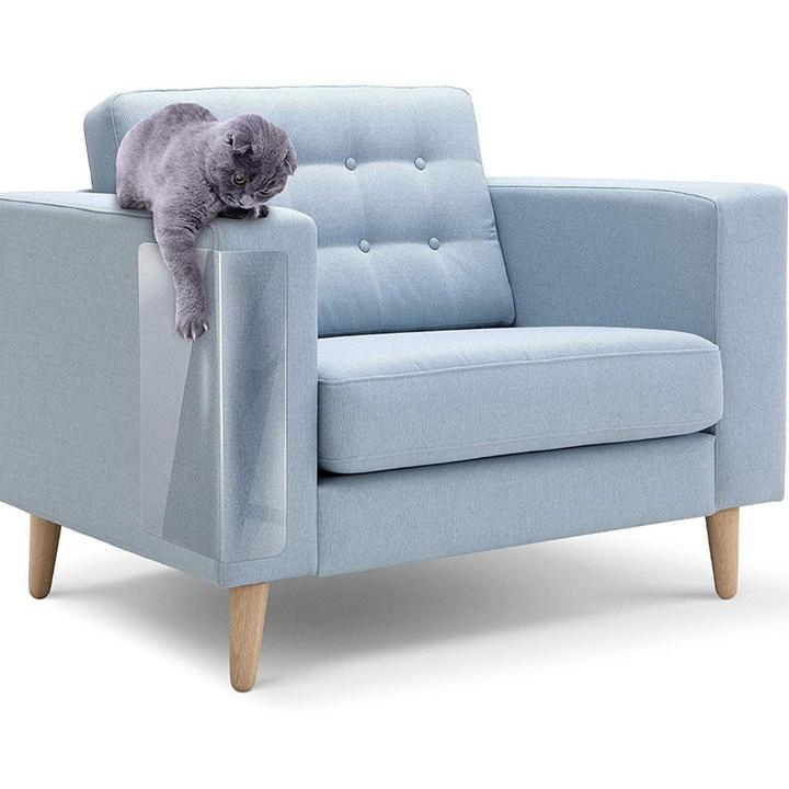 Invisible CatShield Pro furniture scratch protector on a sofa arm. Durable, clear anti-scratch film for pet homes.