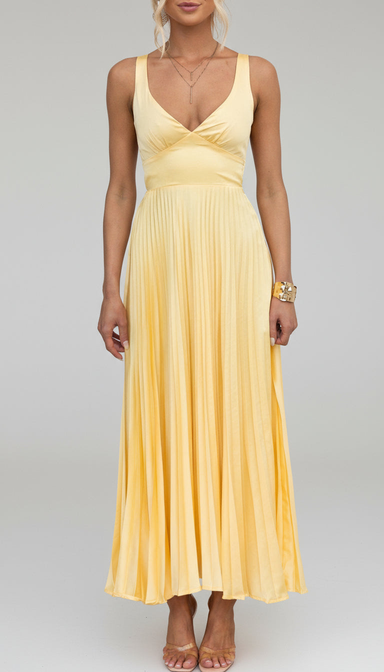Chic pleated V-neck maxi dress for women, featuring a flowing silhouette ideal for parties and elegant events.