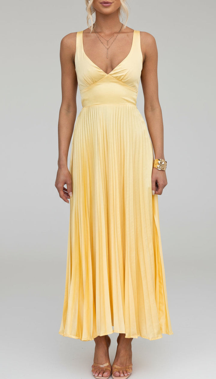 Chic pleated V-neck maxi dress for women, featuring a flowing silhouette ideal for parties and elegant events.