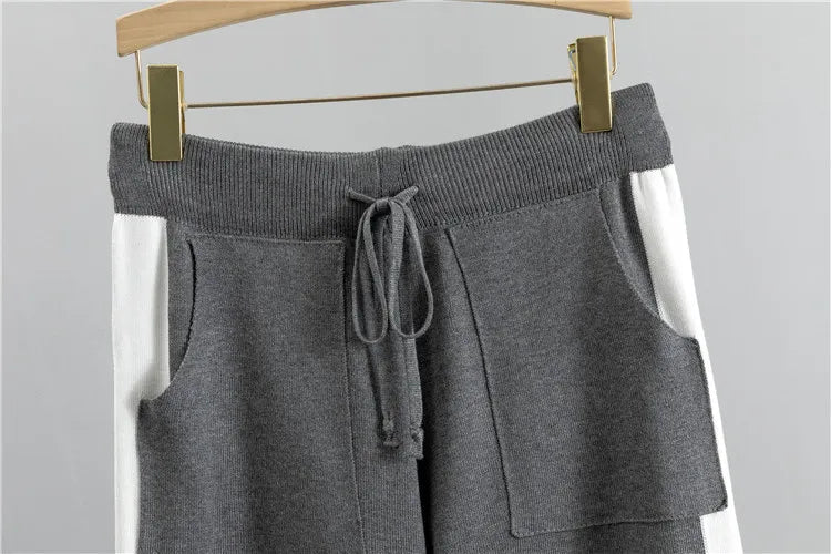 Women's jogger trousers from a comfortable two-piece tracksuit set. Ideal for lounging or casual outfits.