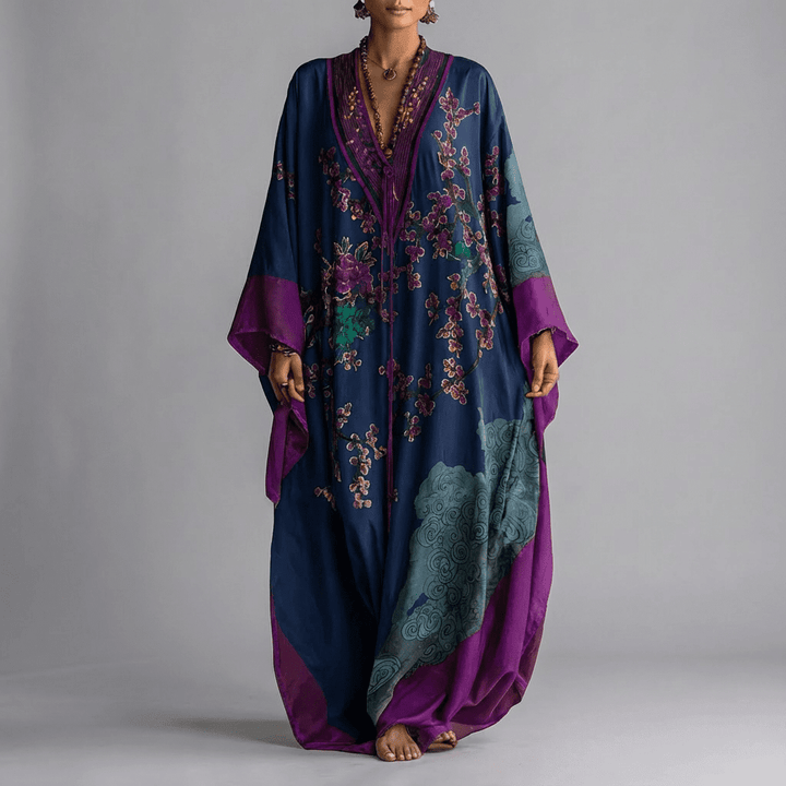 Versatile and comfortable women's beige maxi dress with elegant batwing sleeves and a stylish floral print.