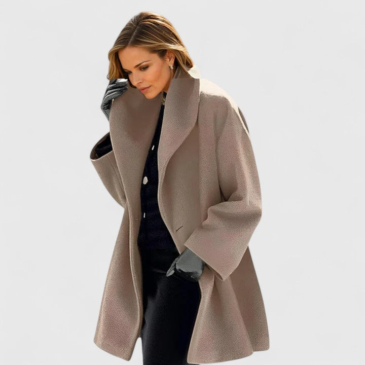 Warm women's long winter coat, elegant and classic style, perfect for sophisticated cold weather fashion.