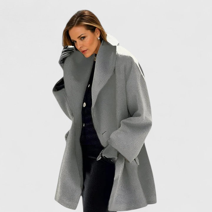 Fashionable women's elegant winter coat, classic long design for cozy warmth & stylish outerwear.