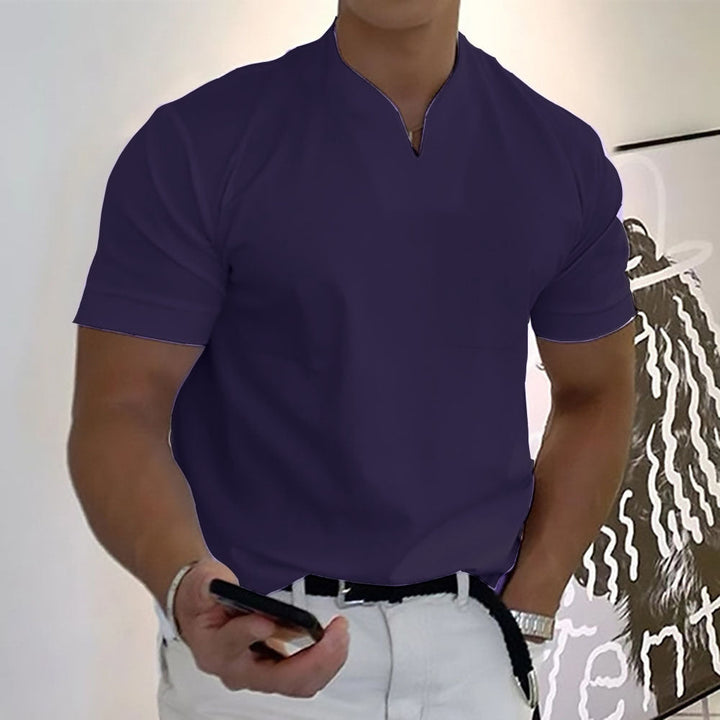 Men's modern t-shirt. Band collar & chest pocket detail. Perfect for casual summer style.
