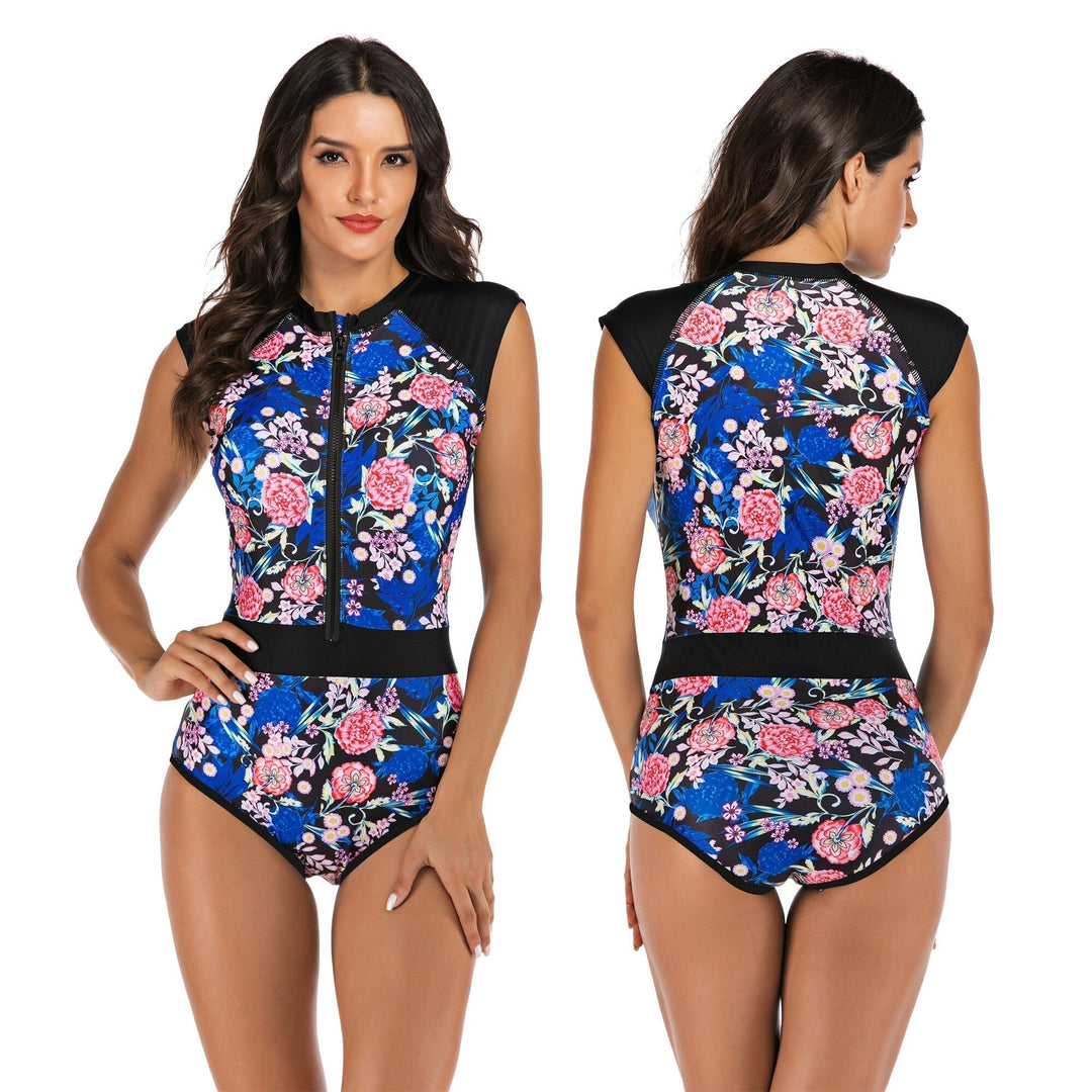 Vibrant one-piece women's athletic swimsuit with dynamic pattern. Quick-dry activewear for pool & beach.