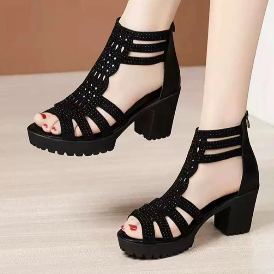 Elegant women's heel sandals in black, offering stylish comfort for parties and formal events.