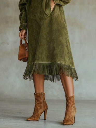 Stylish women's elegant midi dress featuring beautiful fringe detail. Perfect for sophisticated fashion events.
