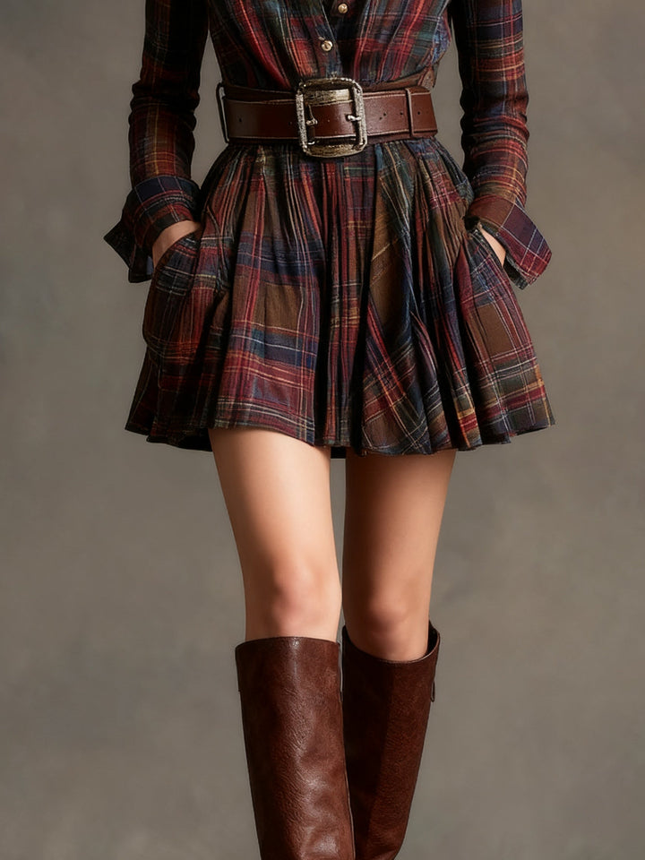 Women's elegant A-line plaid mini dress with long sleeves, perfect for a sophisticated fall look.
