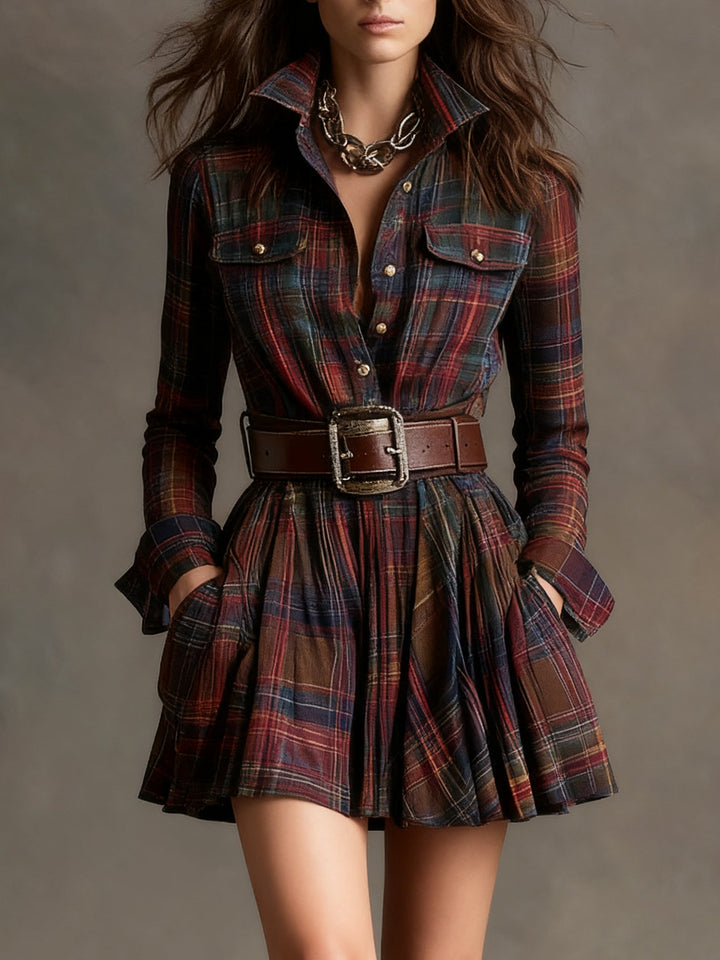 Stylish women's plaid mini dress, featuring a checkered print and long sleeves for winter fashion.