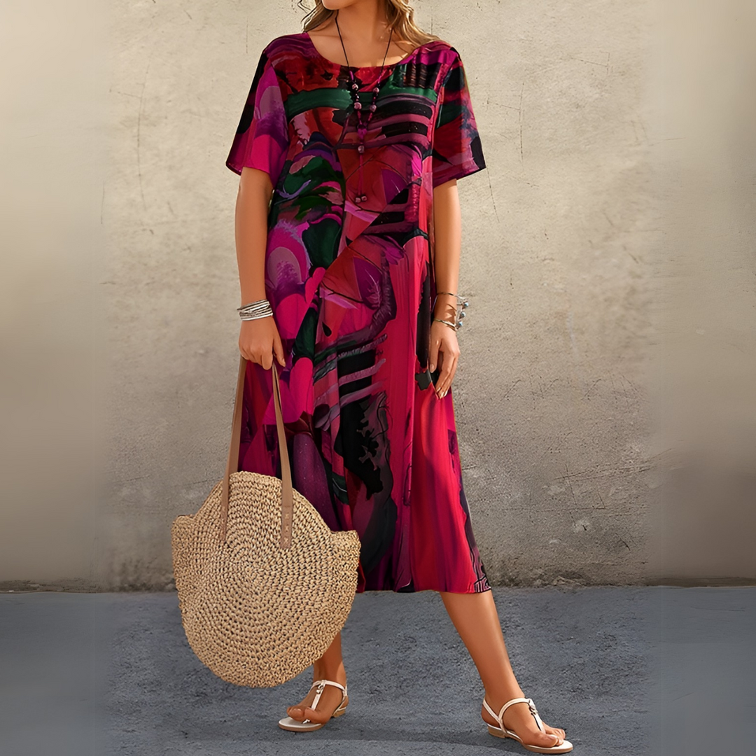 Beautiful flowing floral maxi dress for women. Effortless elegant style, ideal for summer and special occasions.