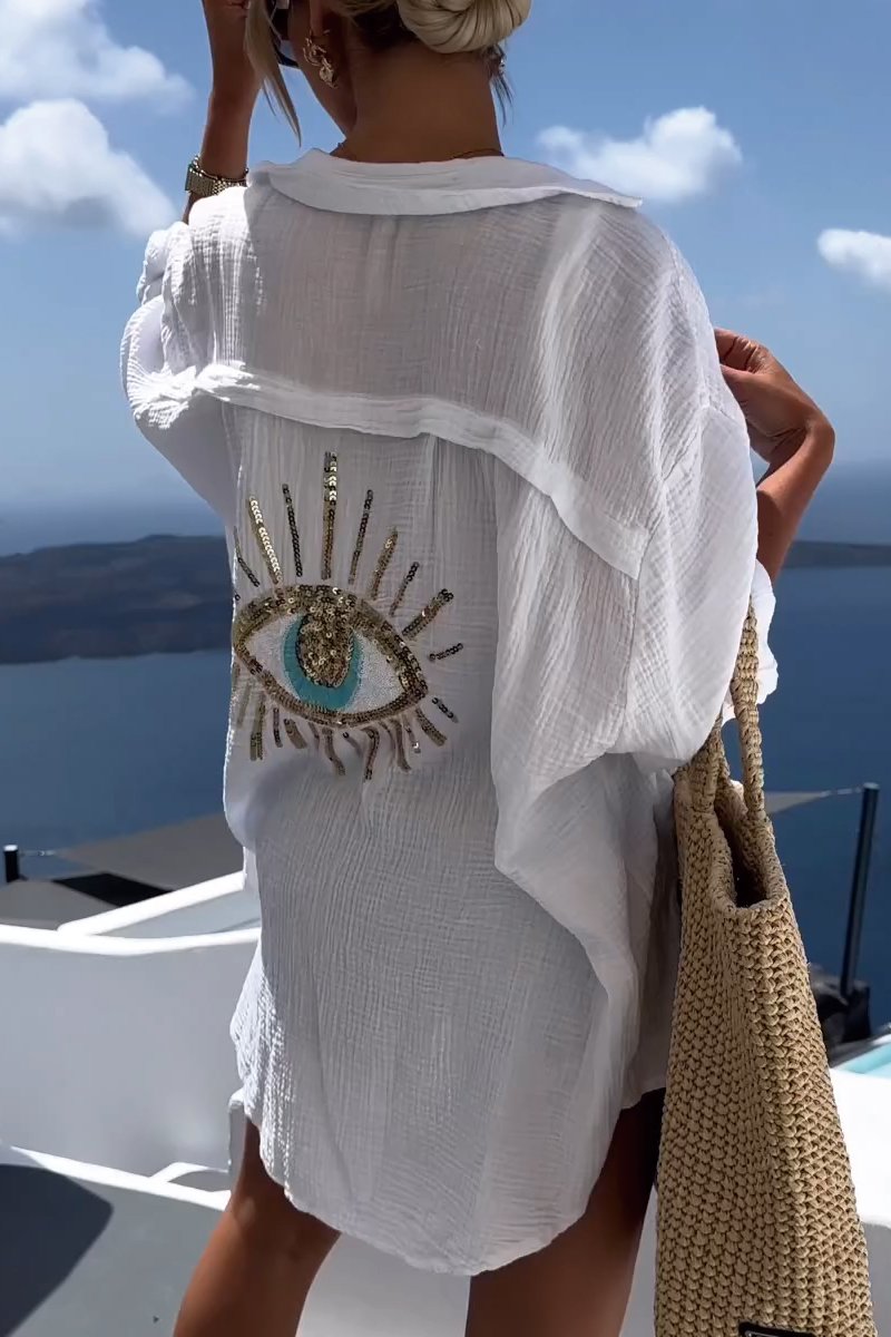Women's Nora oversized blouse with eye pattern, perfect for effortless summer style & casual chic holiday wear.