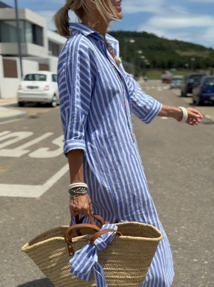 Classic women's striped shirt dress in a flattering midi length. Perfect for versatile spring & summer fashion.