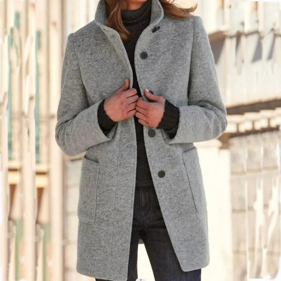 Women's elegant long coat, classic button-front outerwear for versatile fashion and timeless comfort.