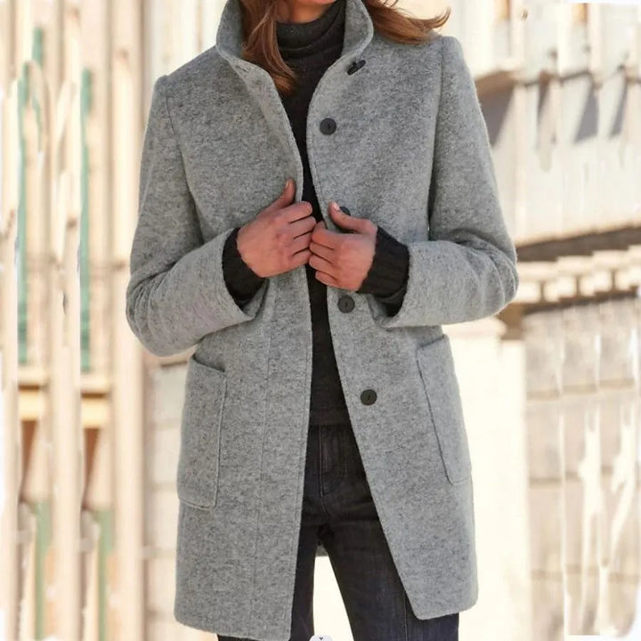 Women's elegant long coat, classic button-front outerwear for versatile fashion and timeless comfort.