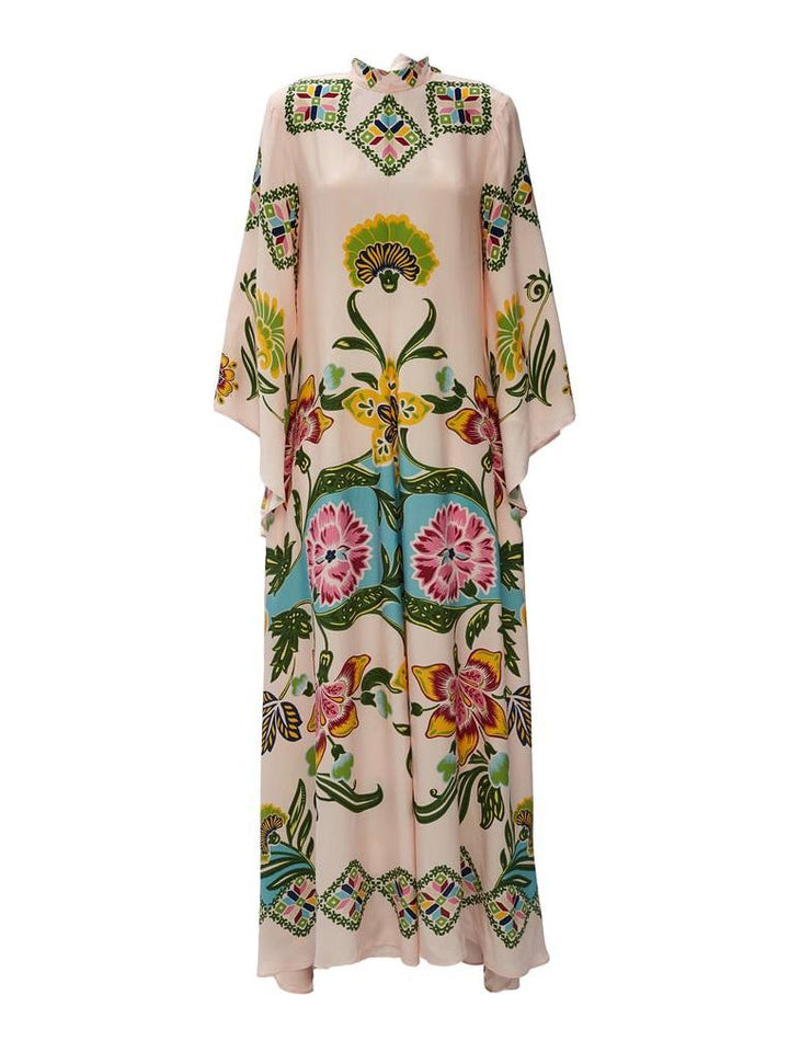 Women's cream floral maxi dress featuring elegant long sleeves and a flowing silhouette, perfect for summer fashion.