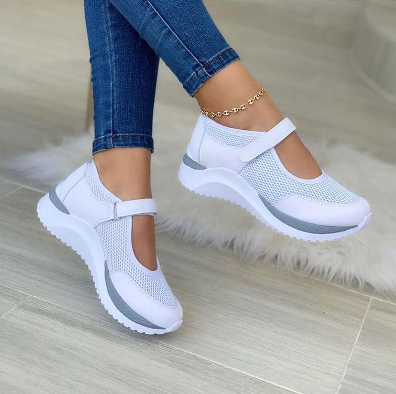 Lightweight, breathable women's orthopedic sneakers, designed for ultimate comfort and support during walking.