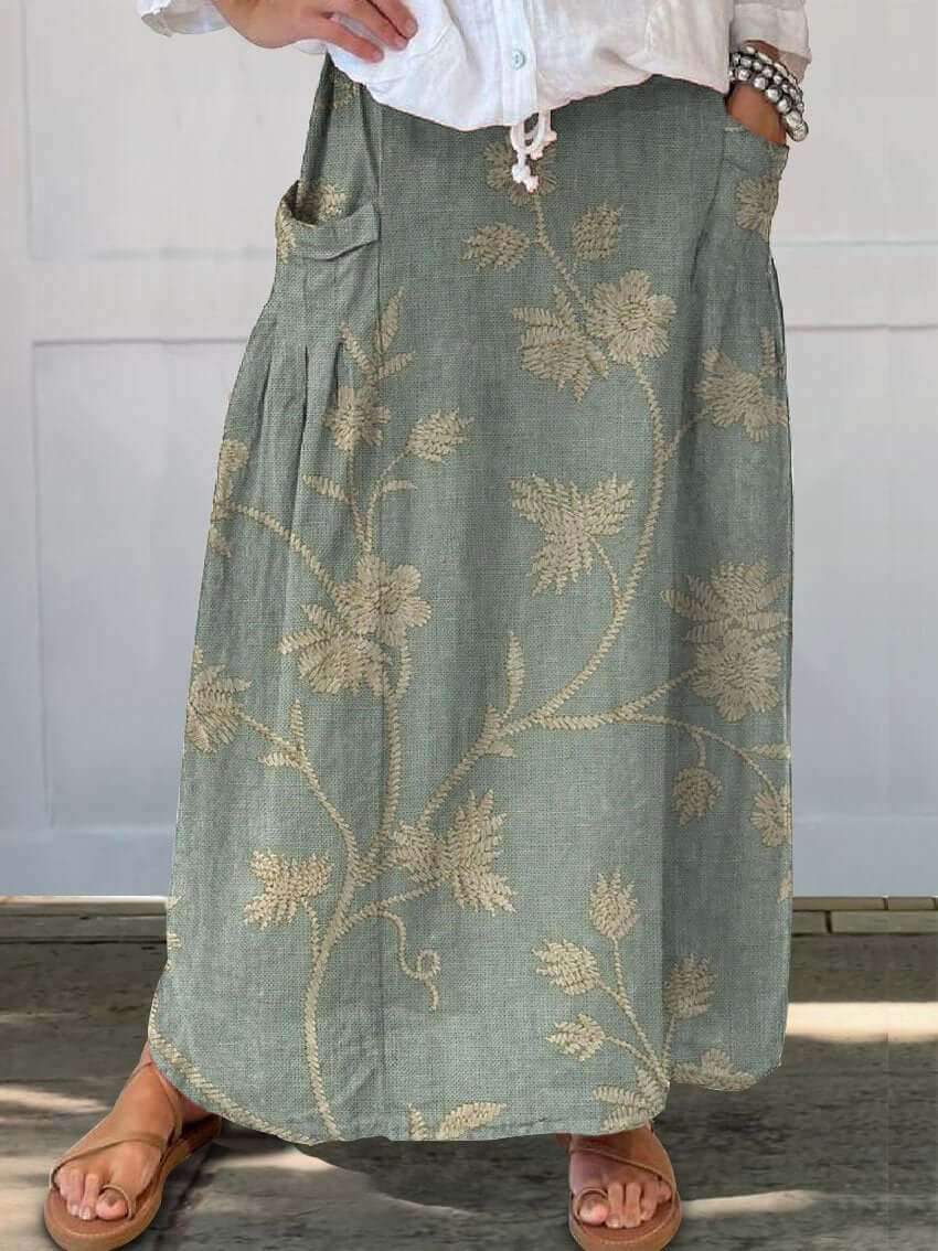 Comfortable women's floral midi skirt. Retro elastic waist design, perfect for elegant casual fashion.