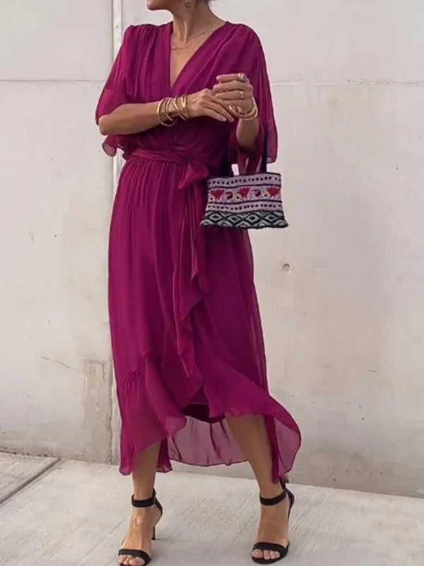 Graceful women's V-neck midi dress with a flattering silhouette, perfect for elegant versatile style.