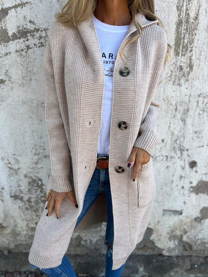 Comfy women's long hooded cardigan with button front, ideal for cozy winter essential outerwear.