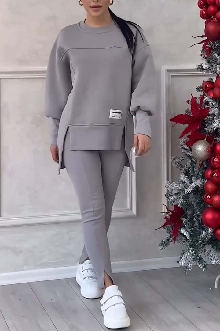 Relaxed fit women's crew neck sweater in soft fabric, part of an oversized loungewear set for autumn.