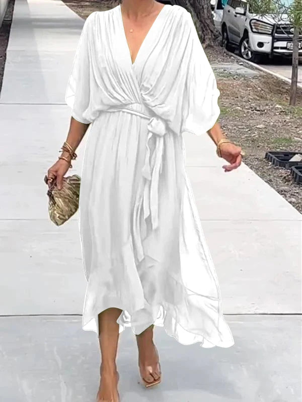 Elegant women's V-neck midi dress, perfect for versatile classic style. Flattering fit for any occasion.