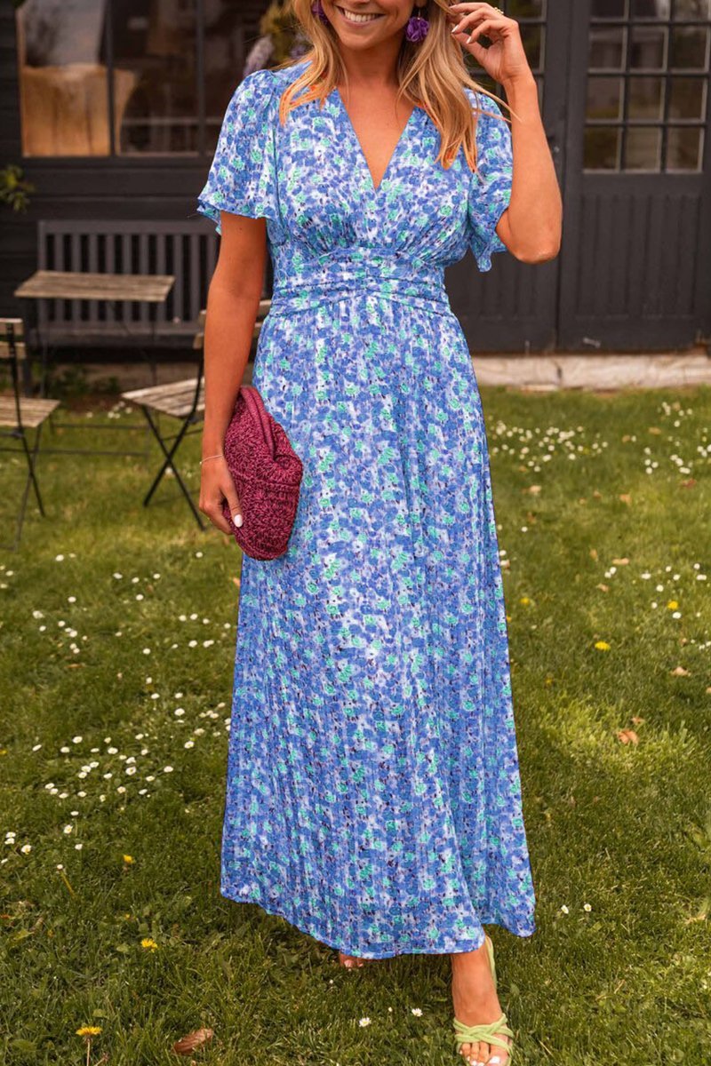 Fashionable women's floral V-neck maxi dress, versatile for elegant summer evenings or casual spring days.