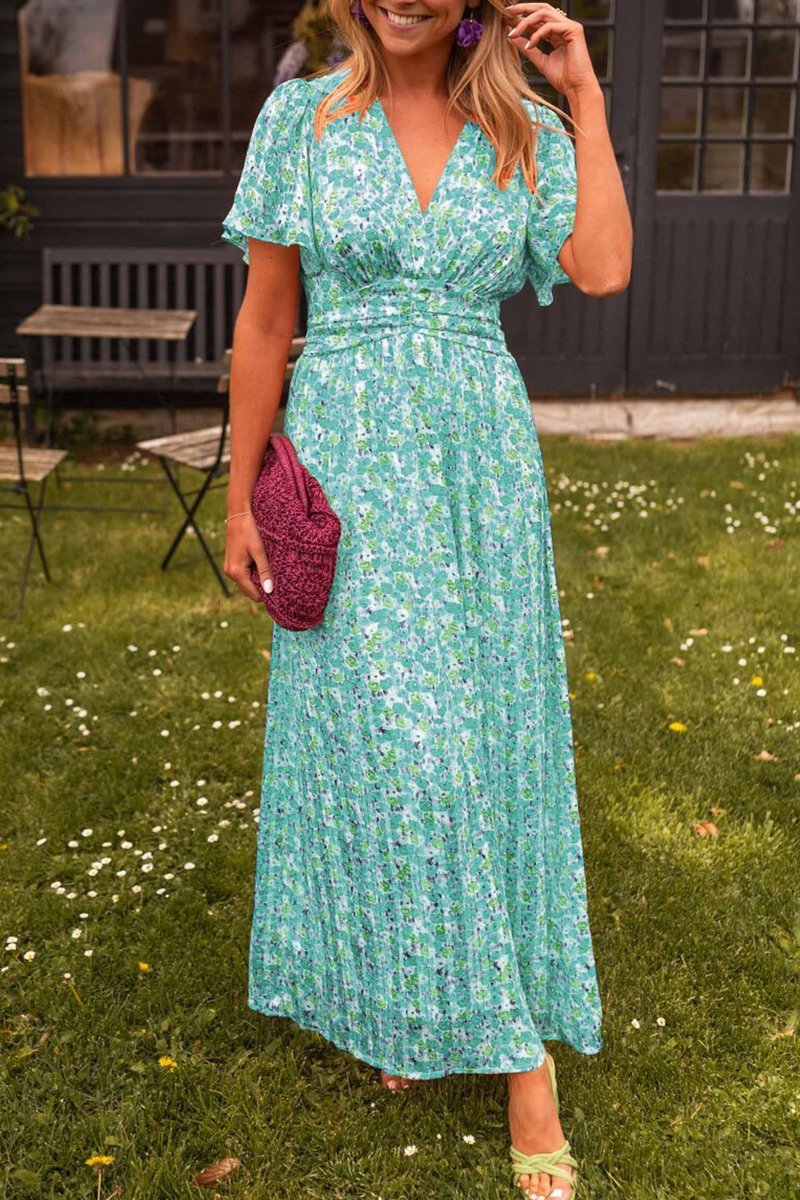 Women's elegant floral maxi dress with a flattering V-neck, designed for comfortable summer and spring wear.
