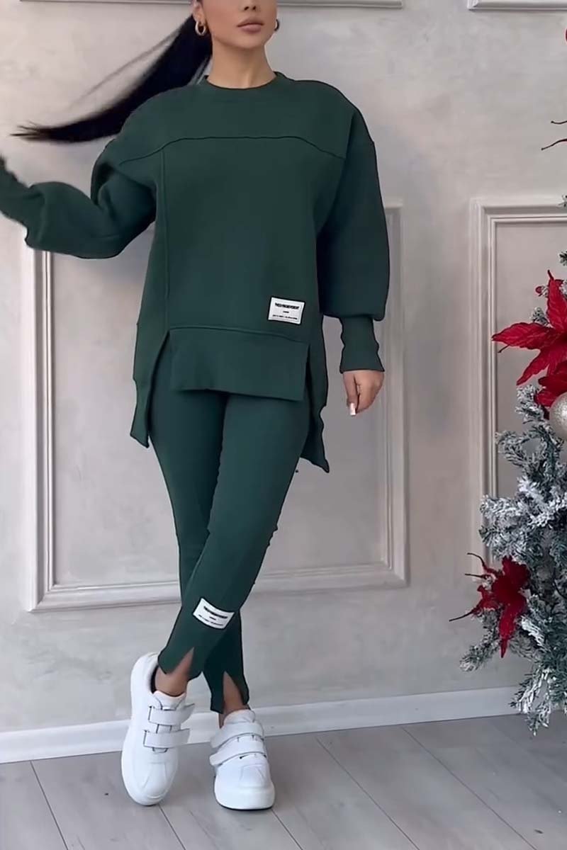 Cozy women's two-piece loungewear set: oversized long-sleeve crew neck sweater & comfortable leggings for relaxed style.