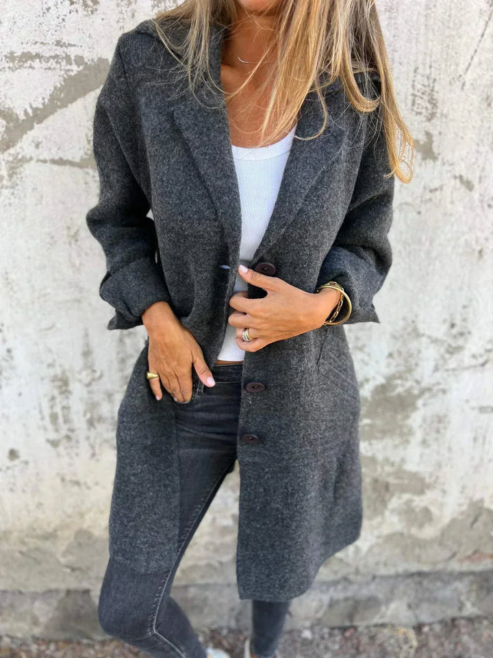 Elegant women's long sleeve blazer jacket with stylish buttons, perfect fashion outerwear.