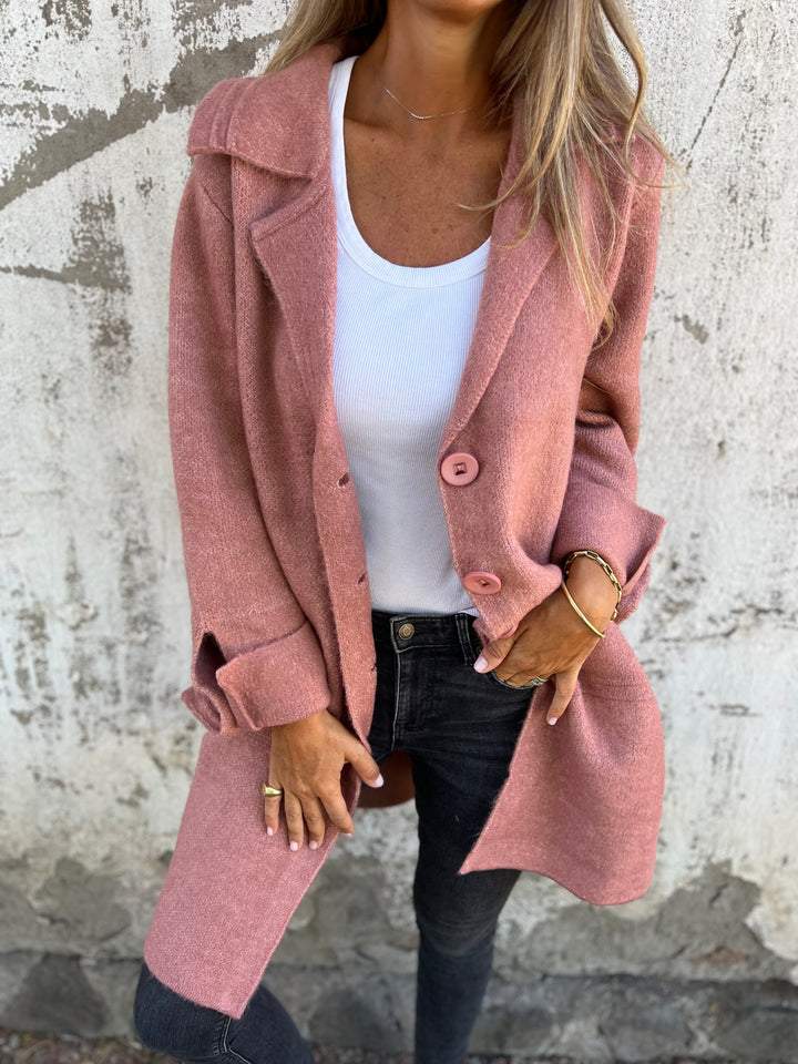 Women's elegant buttoned blazer jacket, versatile fashion outerwear for all seasons.