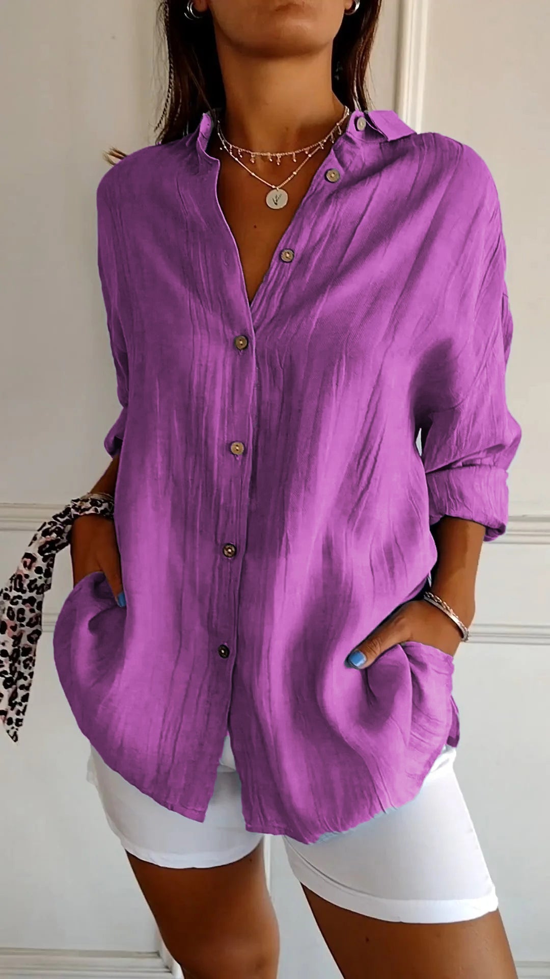 Chic women's blouse with an elegant ruffled collar, adding flair to any outfit.
