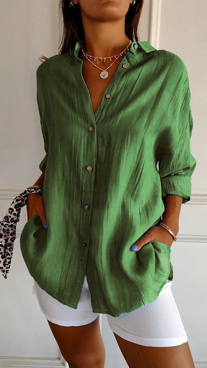 Long sleeve women's shirt, an elegant ruffled top for sophisticated office attire.