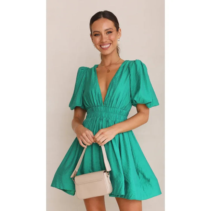 Effortless women's mini dress, lightweight and elegant for summer. A versatile, flattering casual style.