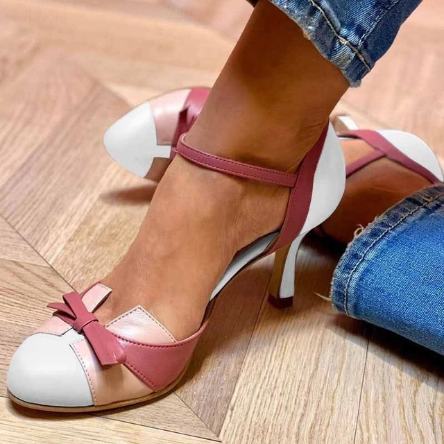 Chic women's dress sandals with elegant heels and ankle strap, great for summer parties & evening footwear.