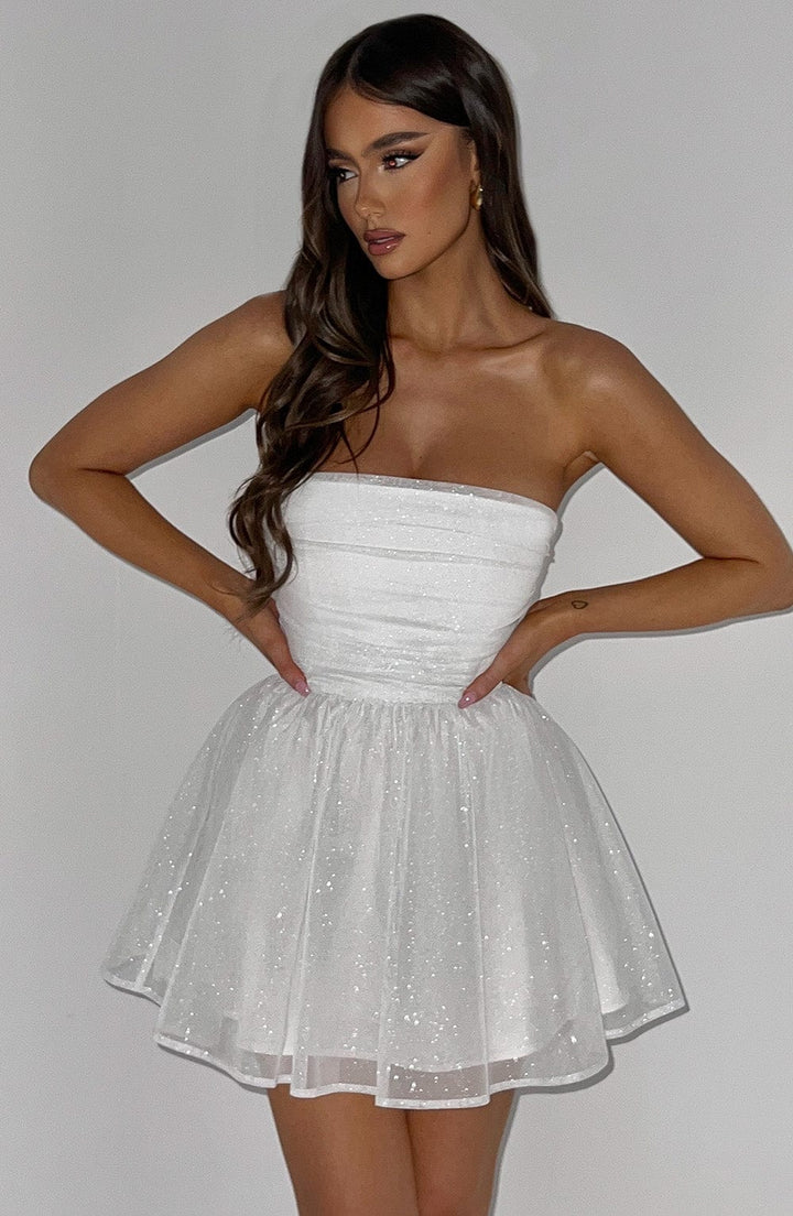 Chic women's strapless mini party dress, A-line design for wedding guests, cocktails, or formal events.