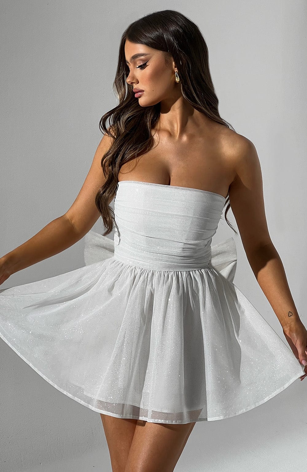 Versatile women's strapless A-line mini dress, an elegant choice for any party or formal occasion.