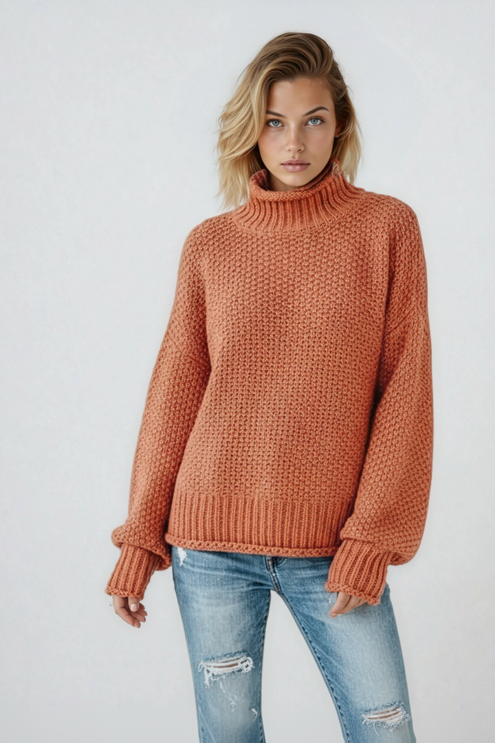 Cozy women's warm turtleneck knit jumper in a stylish relaxed fit, perfect for winter fashion.