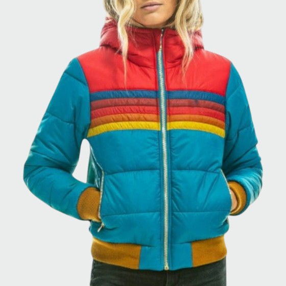 Waterproof puffer jacket for women, designed for outdoor activities, keeping you dry & warm in rain or snow.
