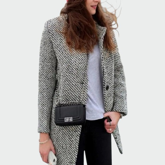 Women's elegant long coat, perfect for winter fashion. Classic, tailored style for ladies' chic outerwear.