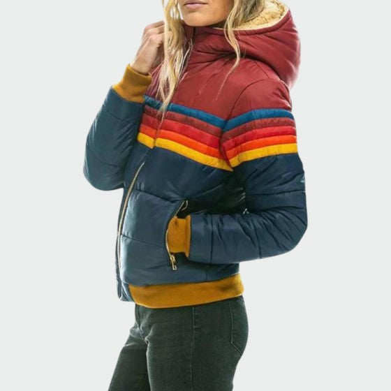 Warm women's puffer coat with waterproof outer shell, great for winter and wet conditions, ultimate comfort.