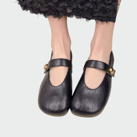Classic women's Mary Jane shoes with comfortable block heel, round toe, and adjustable strap for elegant wear.