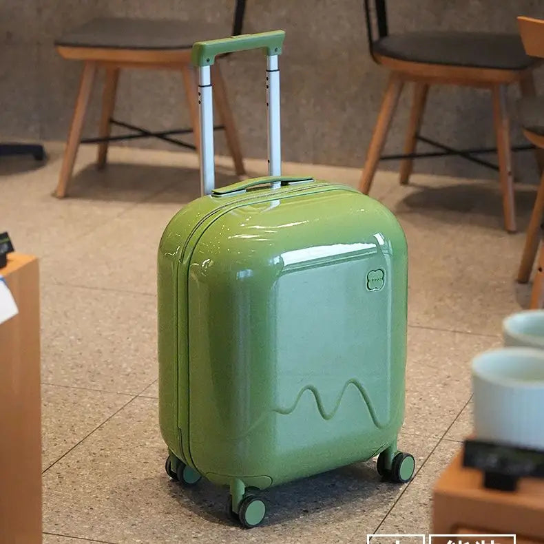 Young traveler's rolling suitcase with a secure combination lock, making vacation travel fun & safe for kids.
