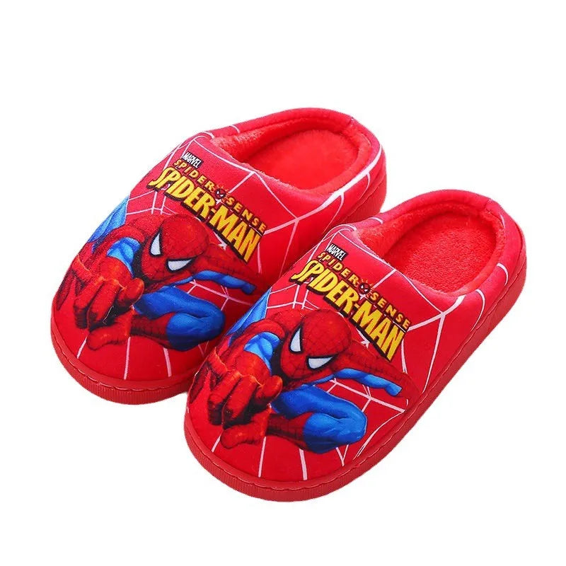 Child's feet in warm Spider-Man indoor slippers. Cozy superhero footwear, perfect for playing indoors in fall & winter.