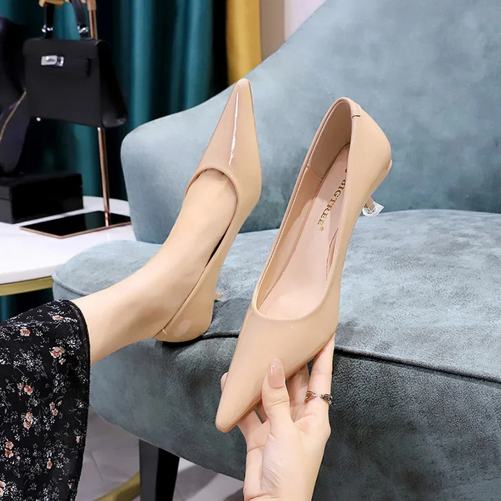 Elegant black kitten heels for women, comfortable low heel fashion footwear.