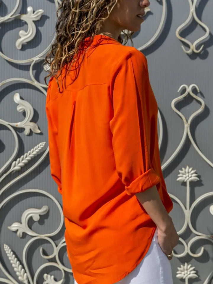 Crisp classic women's blouse, ideal for work. A versatile elegant top for any fashion style.