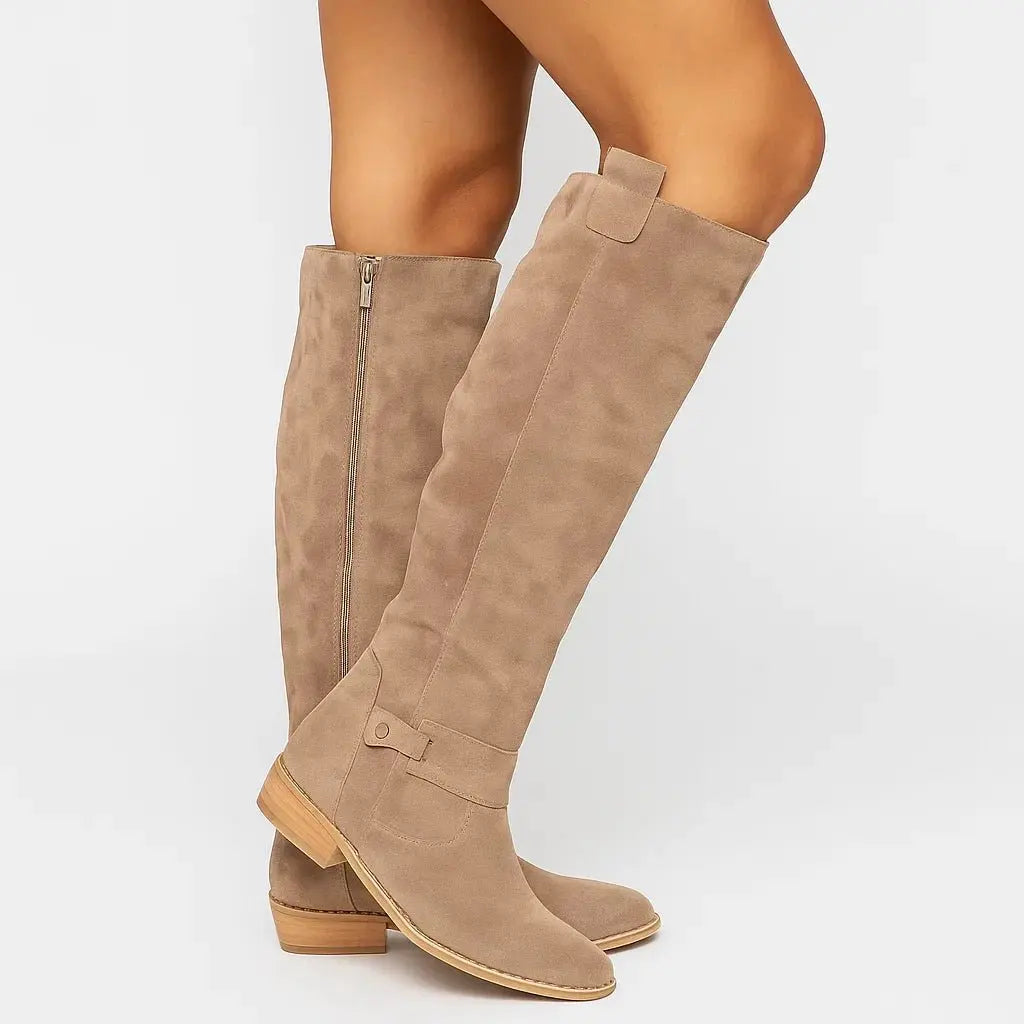 Elegant women's knee-high suede boots with comfortable block heel & side zip. Perfect for versatile autumn/winter style.