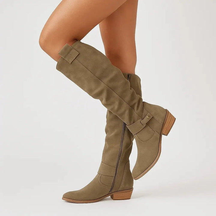 Chic dark green women's knee-high suede boots with a sturdy block heel, perfect for autumn fashion & winter outfits.