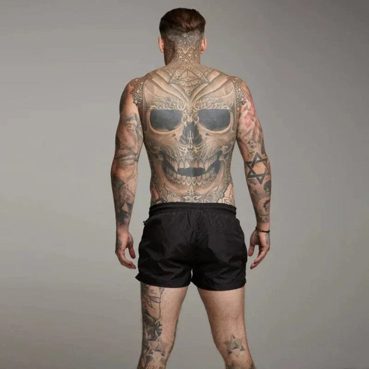 Quick-dry men's swim trunks with a practical pocket. Ideal shorts for summer beach and pool activities.