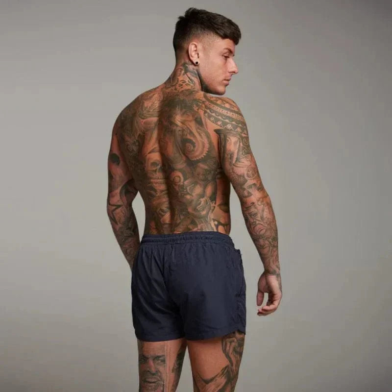 Men's beach swim shorts, perfect for summer pool days & vacations. Stylish, quick-dry active swimwear.