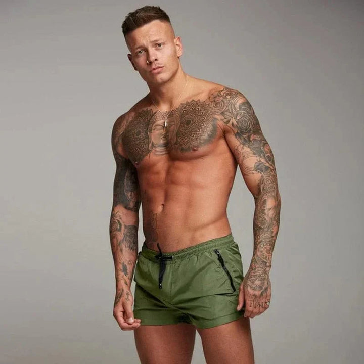 Versatile men's swim trunks for summer. Stylish, quick-dry shorts with pocket for beach, pool, or active wear.